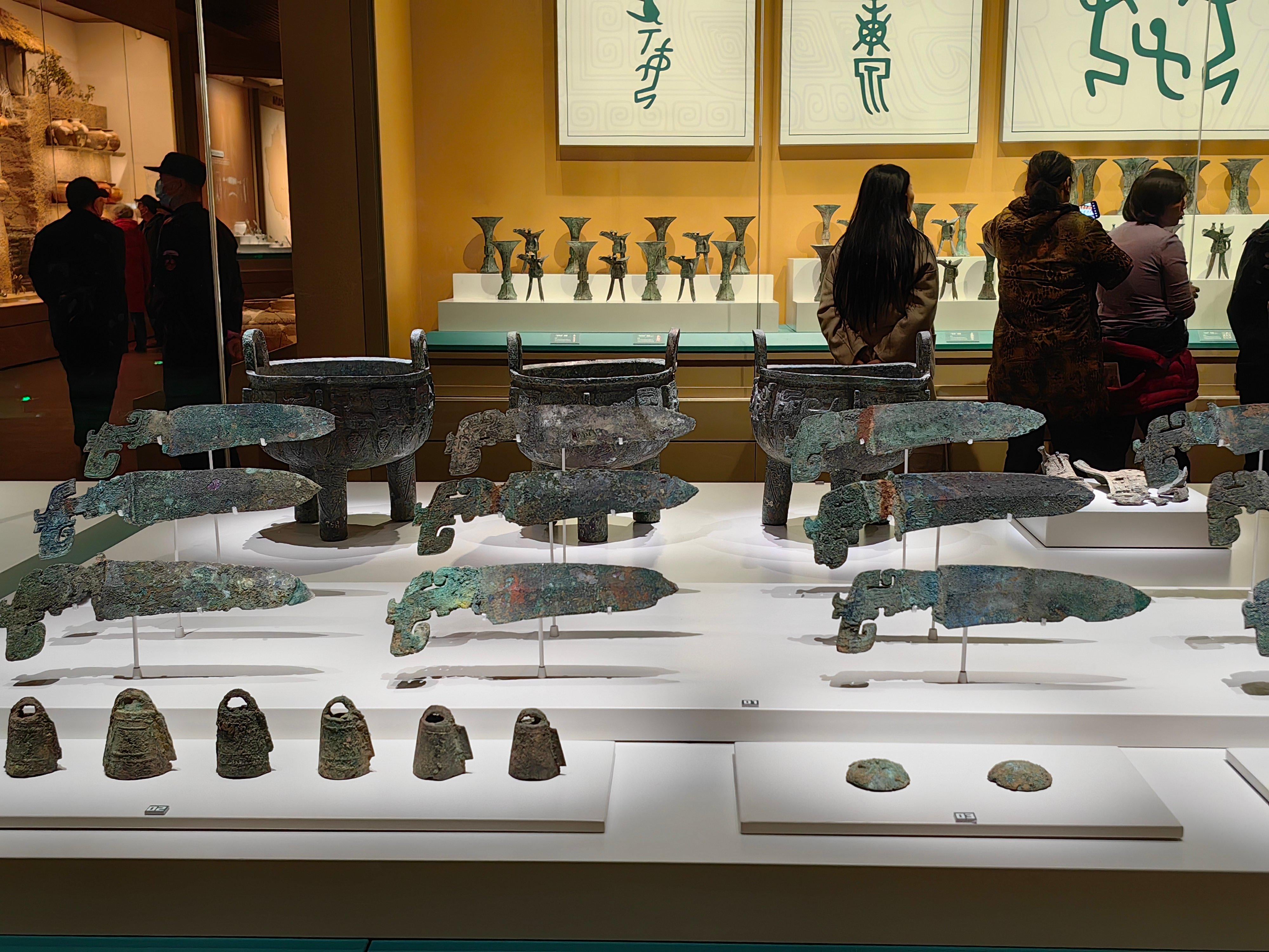 Bronze Weapons, Bells And Vessels From The Tomb Of Queen Fu Hao. China 